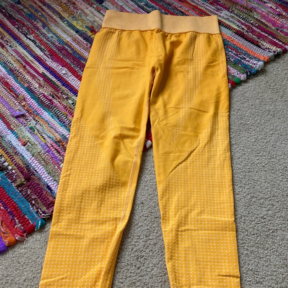 Women’s full length orange leggings.